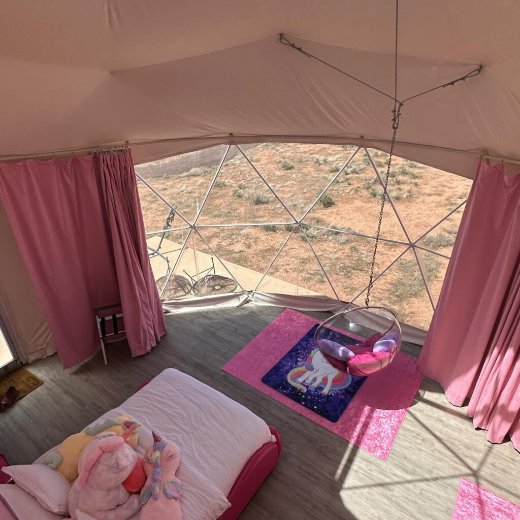 PinkUnicorn-Overhead-Dome Interior of pink unicorn themed lodging sky dome at Clear Sky Resorts in Valle, AZ