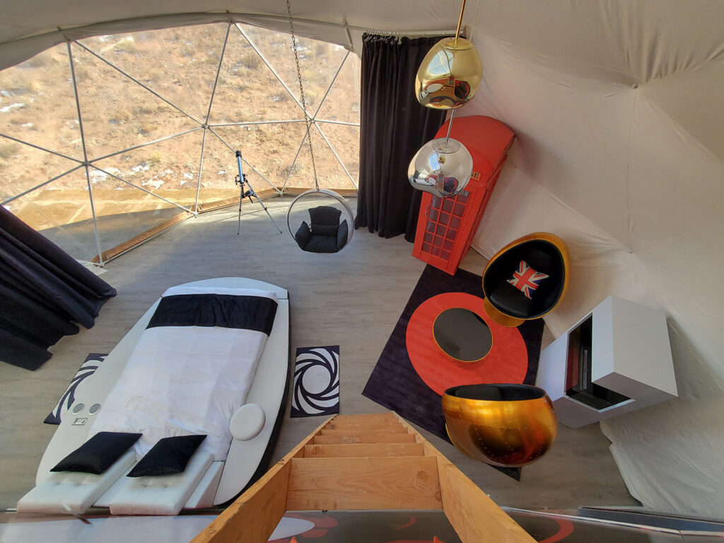 Secret-Agent-Dome-Overhead Red novelty phone booth at Clear Sky Resorts secret agent themed sky dome in Valle, AZ