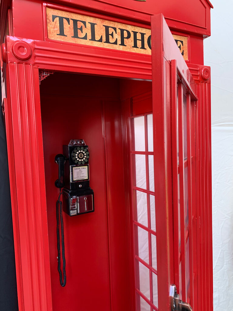 Secret-Agent-Phone-Booth Red novelty phone booth at Clear Sky Resorts secret agent themed sky dome in Valle, AZ