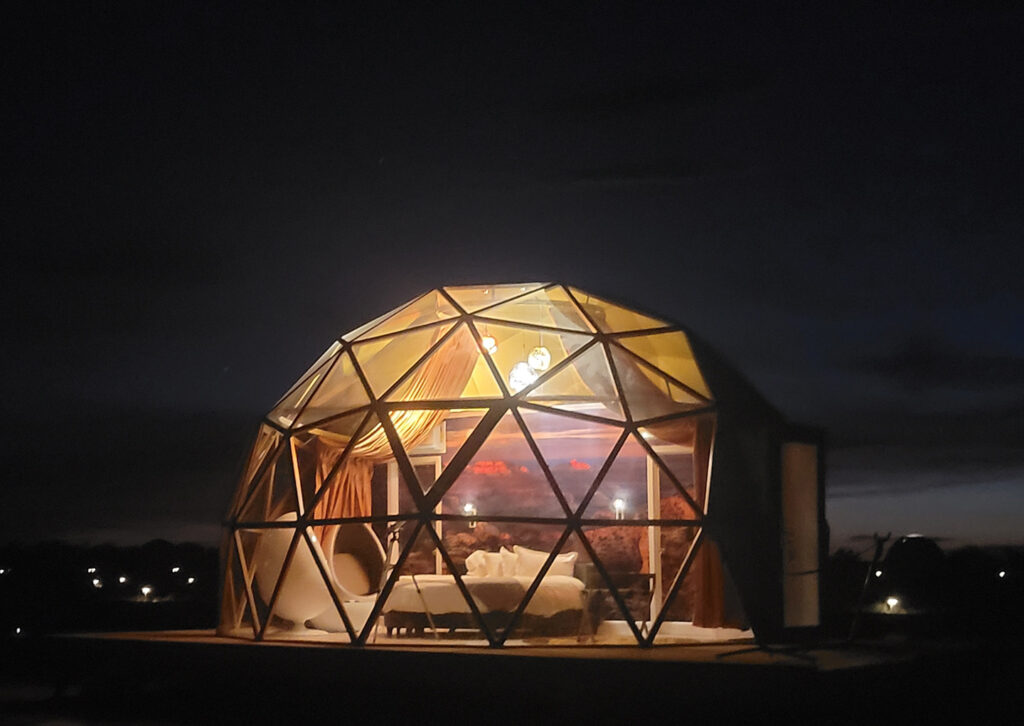 Snow Globe Dome NIGHT Exterior2 Luxury dark sky Snow Globe dome glamping lodge available at Clear Sky Resorts near Grand Canyon National Park in Valle, AZ.